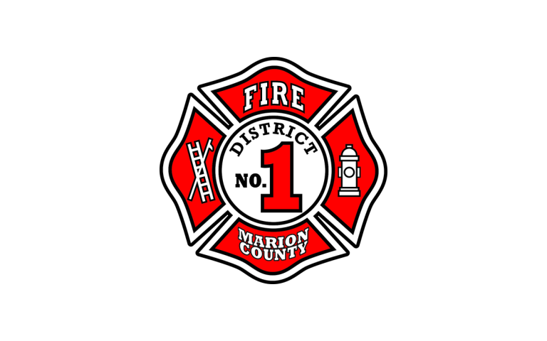 A red and black fire department emblem with a Maltese cross design. It features the text "Fire District No. 1 Marion County," along with an image of a fire hydrant and a ladder with an axe.